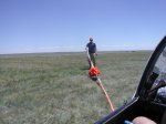 Noah help with launch 6-30-10.JPG - <p>Noah P laying out the winch rope - June 2010</p>